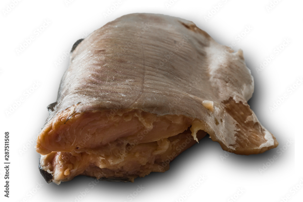 Naklejka premium Salted pink salmon without skin. View from the front and backlight. Isolated image . A popular snack. A site about fish, cuisine and cookery.