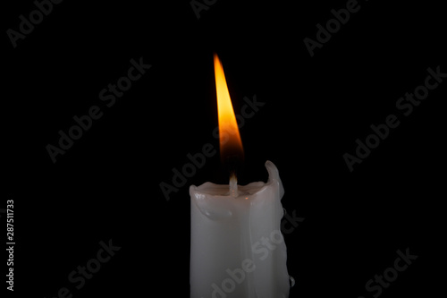 Close up of white wax candle flame