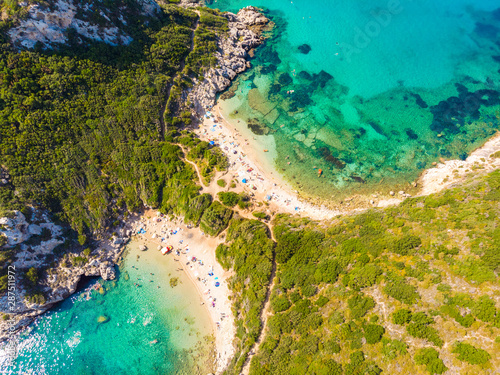 Aerial view of Porto Timoni beach at Afionas is a paradise double beach with crystal clear azure water in Corfu, Ionian island, Greece, Europe