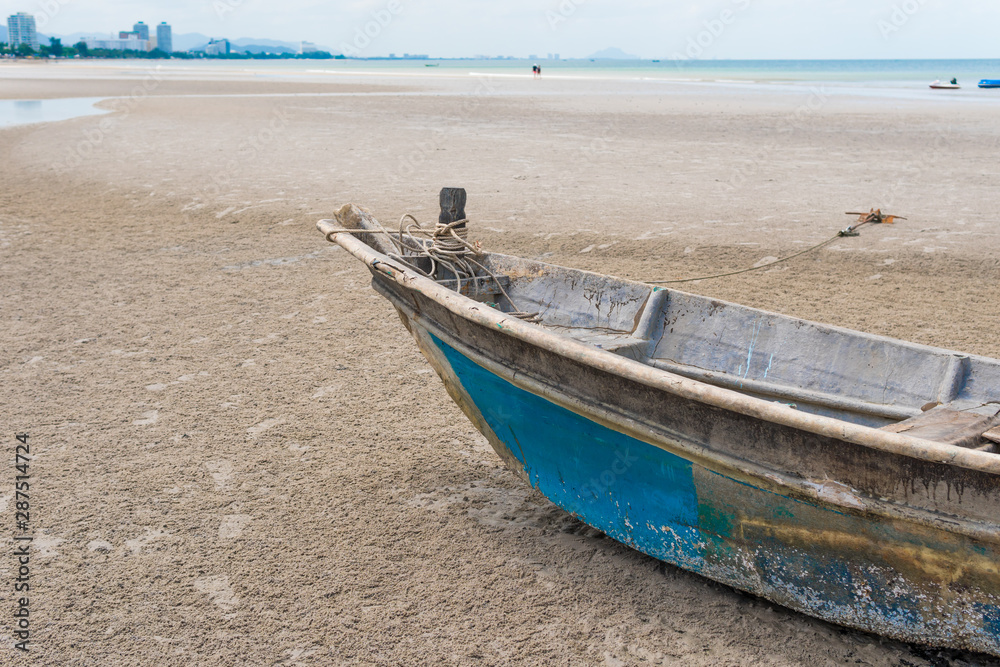 Boat wreck ( Broken wooden boat ) on the sand in the beach. Boat wreck ( Broken wooden boat ) on the sand in the beach.