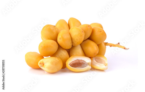 yellow raw date palm isolated on white background