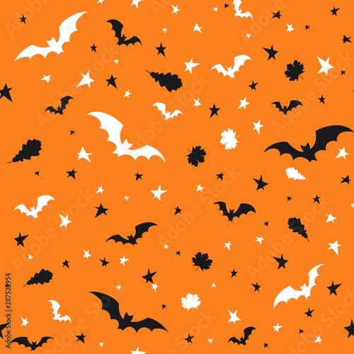 Halloween. Seamless pattern with bats, stars and leaves on an orange background. Endless background, wallpaper, wrapping. Vector illustration.