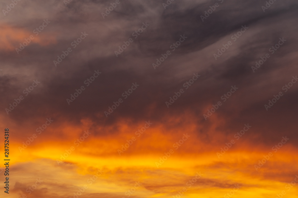 Orange cloud sky at dusk