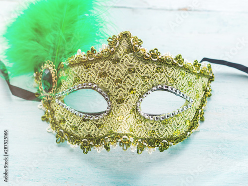 Mardi gras mask on pastel background.