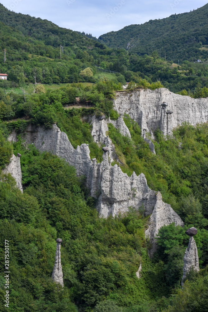 Monument rocks (Chalk Pyramids) of Zone at lake Iseo in Italy