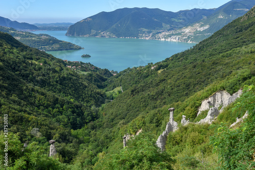 Monument rocks (Chalk Pyramids) of Zone at lake Iseo in Italy photo
