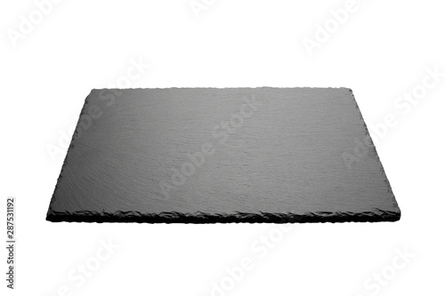 Empty food black square slate plate board isolated on white background. Dark grey slate board for dishes.