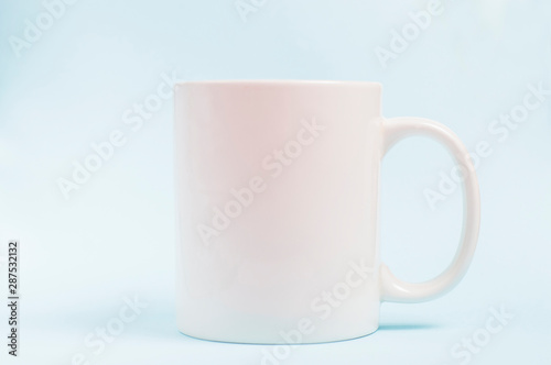 white mug on a light blue background