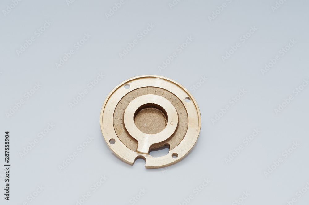 Spare part round disc for water pump isolated on white.