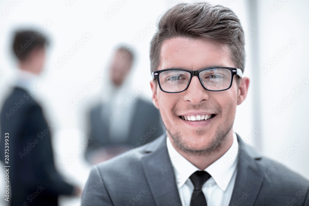 close up. the face of a young businessman in the office. close up. the face of a young businessman in the office.