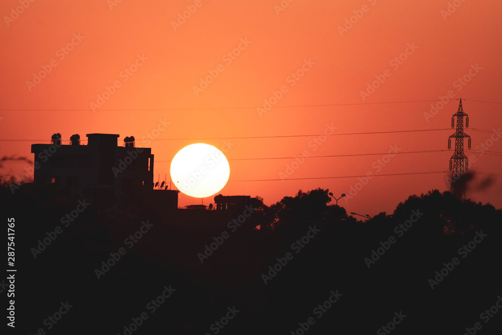 Fototapeta premium Black and orange background, sunset
