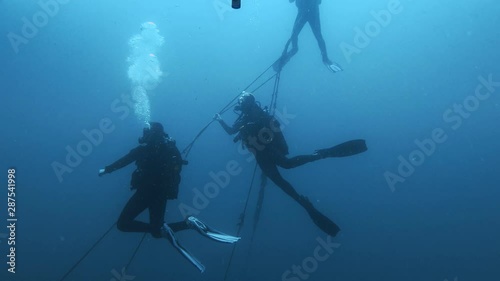 Wallpaper Mural Divers underwater near underwater wreck Torontodigital.ca