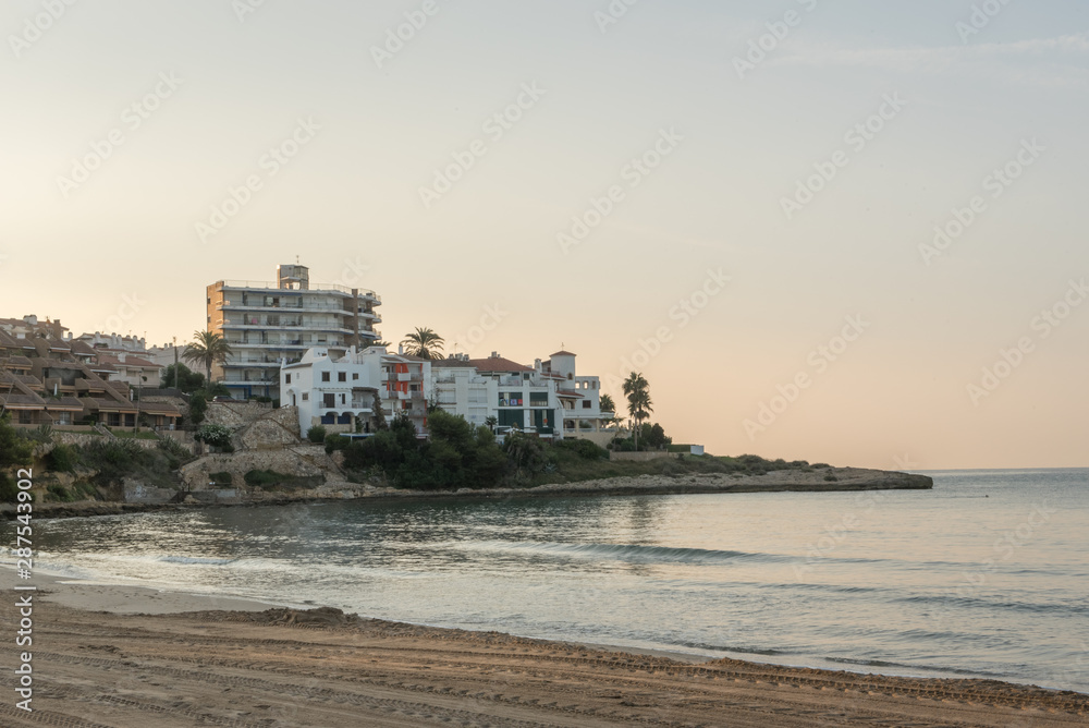 View of Altafulla, Tarragona, Spain. Beach in summer on the Sunset.