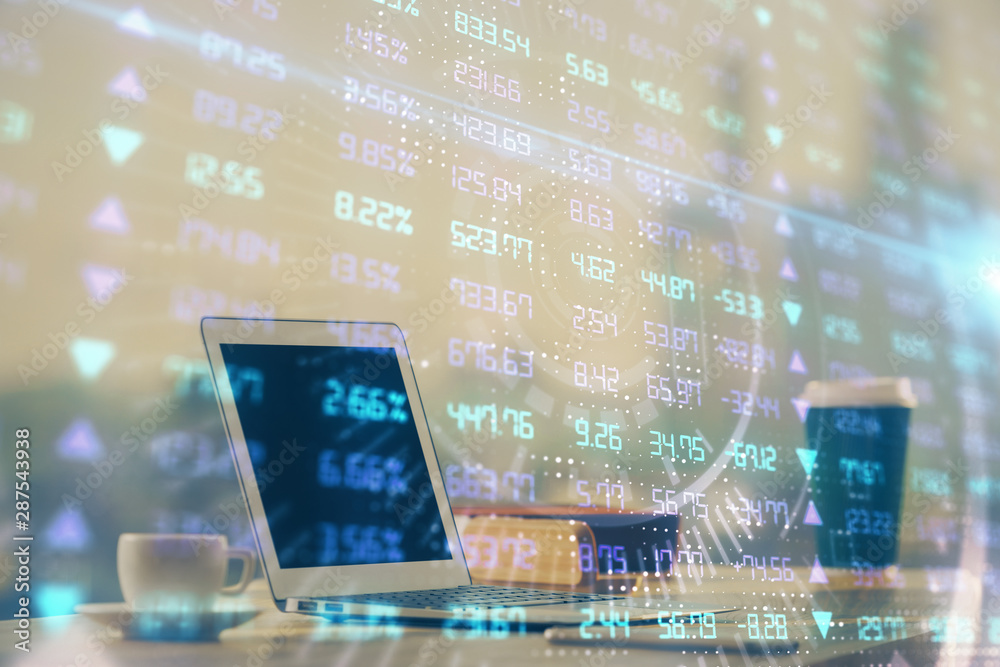 Forex market graph hologram and personal computer on background. Multi exposure. Concept of investment. Forex market graph hologram and personal computer on background. Multi exposure. Concept of investment.