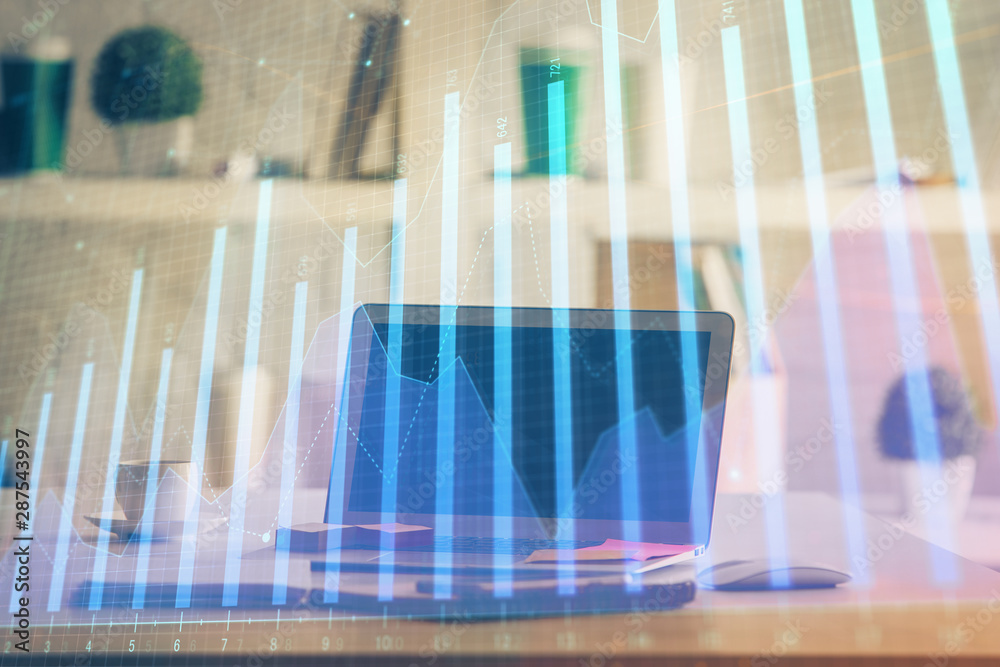 Stock market graph and table with computer background. Double exposure. Concept of financial analysis. Stock market graph and table with computer background. Double exposure. Concept of financial analysis.