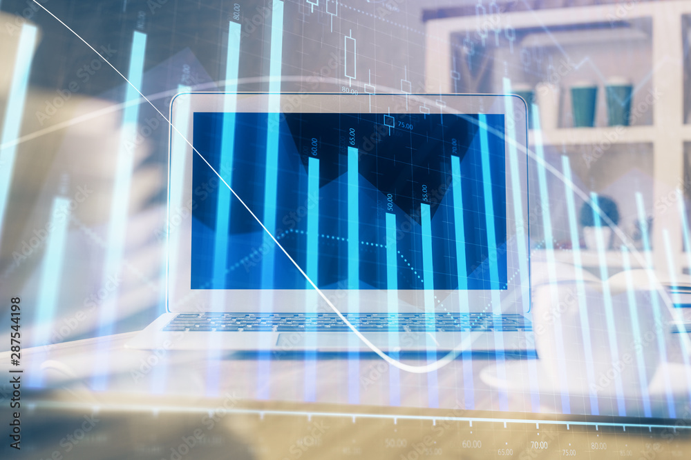 Stock market graph and table with computer background. Double exposure. Concept of financial analysis. Stock market graph and table with computer background. Double exposure. Concept of financial analysis.