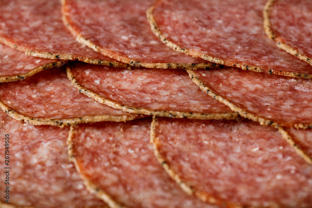 delicious sliced salami sausage . top view delicious sliced salami sausage . top view