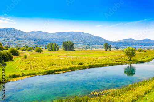 Beautiful landscape in valley of Gacka river, field aerial summer view, Lika region of Croatia