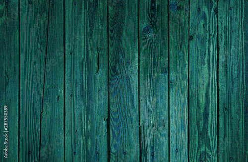 Some old wood planks fresh stained in blue