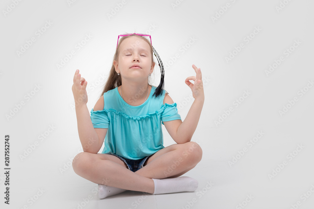 Thoughtful little girl six years old daughter look away on copy space thinking isolated on grey beige background, funny kid pout lips hold finger near mouth conceived some kind of prank, concept image Thoughtful little girl six years old daughter look away on copy space thinking isolated on grey beige background, funny kid pout lips hold finger near mouth conceived some kind of prank, concept image