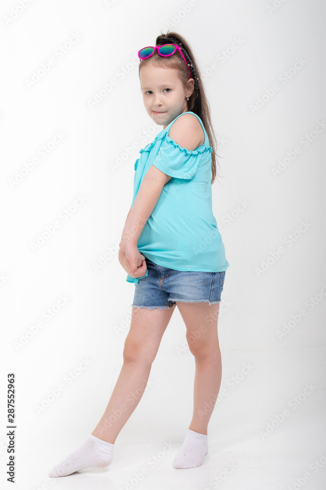 Thoughtful little girl six years old daughter look away on copy space thinking isolated on grey beige background, funny kid pout lips hold finger near mouth conceived some kind of prank, concept image Thoughtful little girl six years old daughter look away on copy space thinking isolated on grey beige background, funny kid pout lips hold finger near mouth conceived some kind of prank, concept image