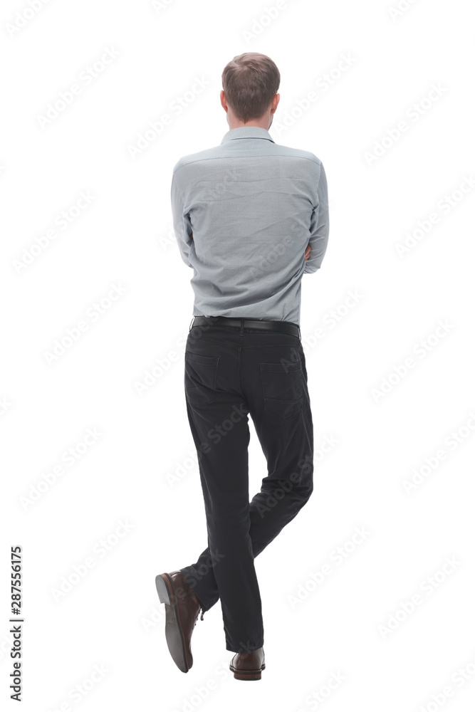 rear view. smiling business man looking at copy space rear view. smiling business man looking at copy space