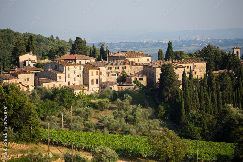 View to the town on the hills of Tuscany, Italy