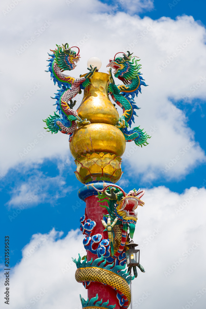 legend of golden dragon sculpture on pillar and blue sky - can use to display or montage on your product, chinese history