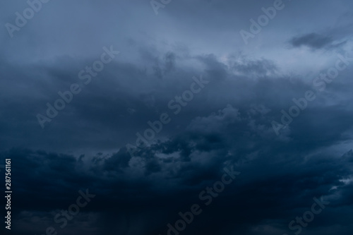 Dramatic stormy dark cloudy sky, natural photo background
