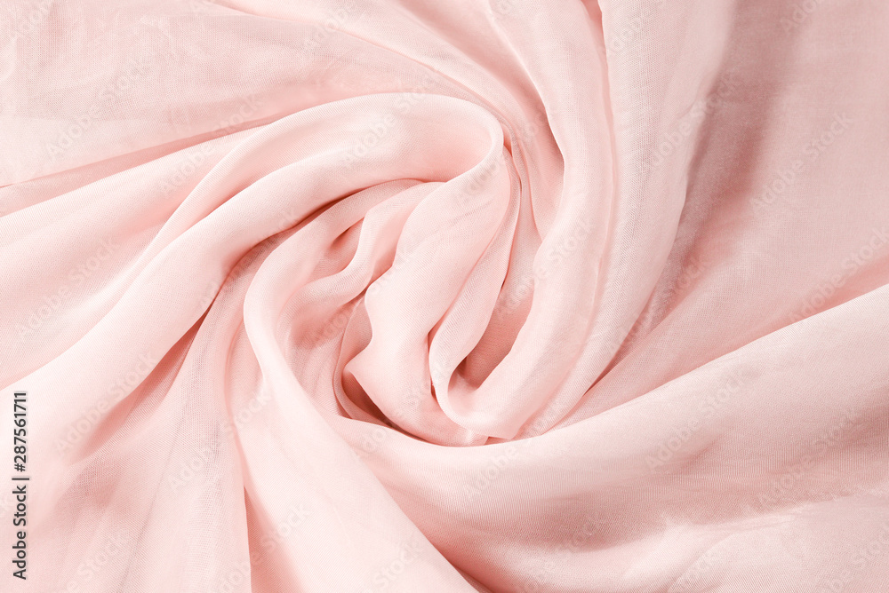 Obraz premium Soft smooth pink silk fabric background. Fabric texture.