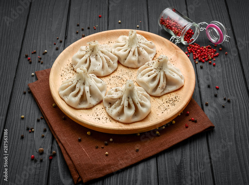 Georgian dumplings Khinkali with meat, tasty and healthy food photo