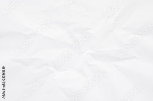 Clean white paper, wrinkled, abstract background.