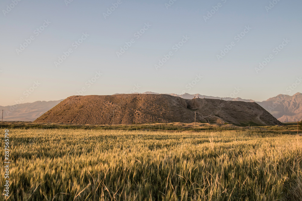 Iraq Kurdistan landscape view of Zagros and ancient mound