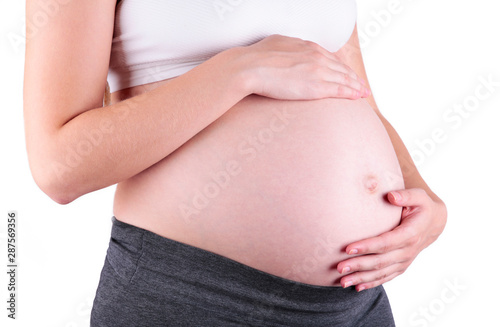 A cute pregnant belly isolated on a white background