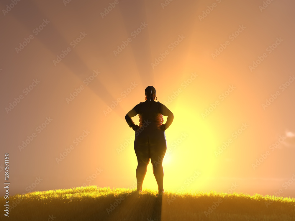 overweight woman looks at the sunrise