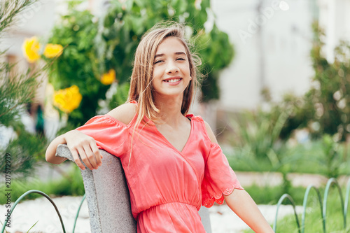 Photos Outdoor portrait of 12 years old girl with long hair