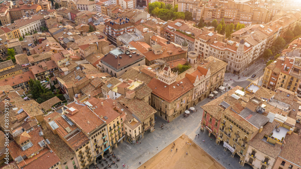 Vic  Barcelona Province, Catalonia, Spain. Aerial photo of main square streets. Beautiful sunset golden hour light