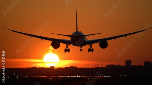 Dreamliner landing at sunrise