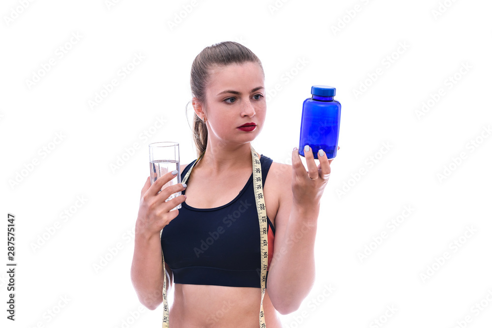 Young woman with pills in bottle isolated on white Young woman with pills in bottle isolated on white