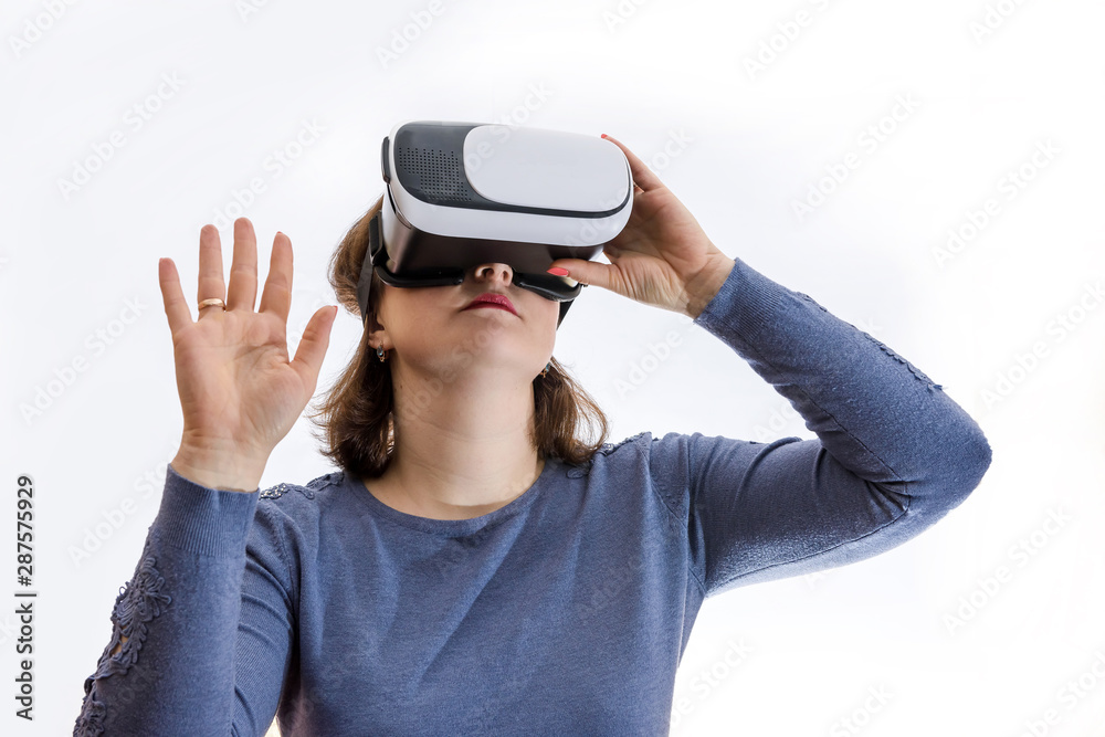 Woman looking via virtual reality isolated on white background