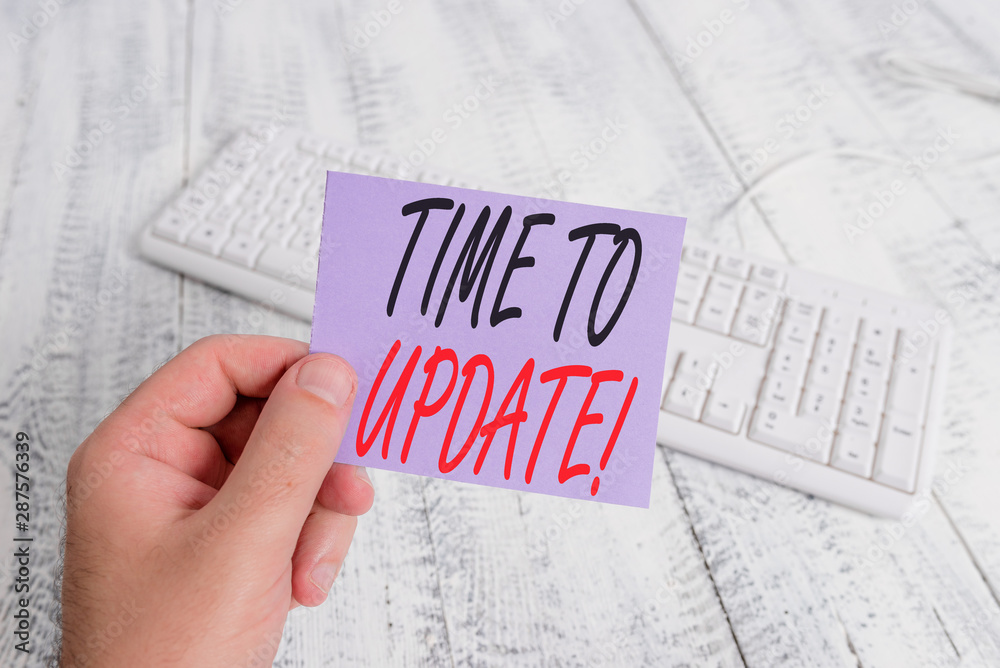 Text sign showing Time To Update. Business photo showcasing this is right moment to make something more modern new man holding colorful reminder square shaped paper white keyboard wood floor Text sign showing Time To Update. Business photo showcasing this is right moment to make something more modern new man holding colorful reminder square shaped paper white keyboard wood floor
