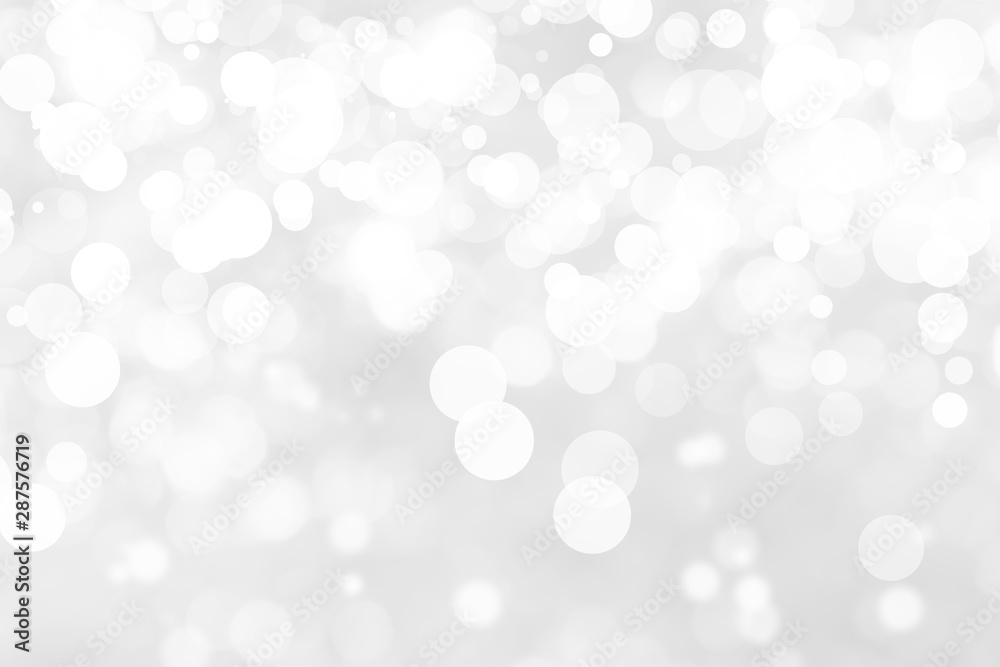 Abstract background with White bokeh on gray background. christmas blurred beautiful shiny Christmas lights. Abstract background with White bokeh on gray background. christmas blurred beautiful shiny Christmas lights.