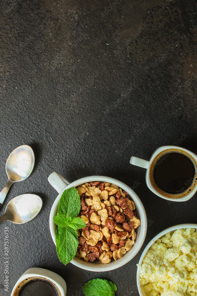 Fototapeta premium breakfast, cornflakes, coffee, cottage cheese others - delicious and healthy, menu concept. food background. copy space