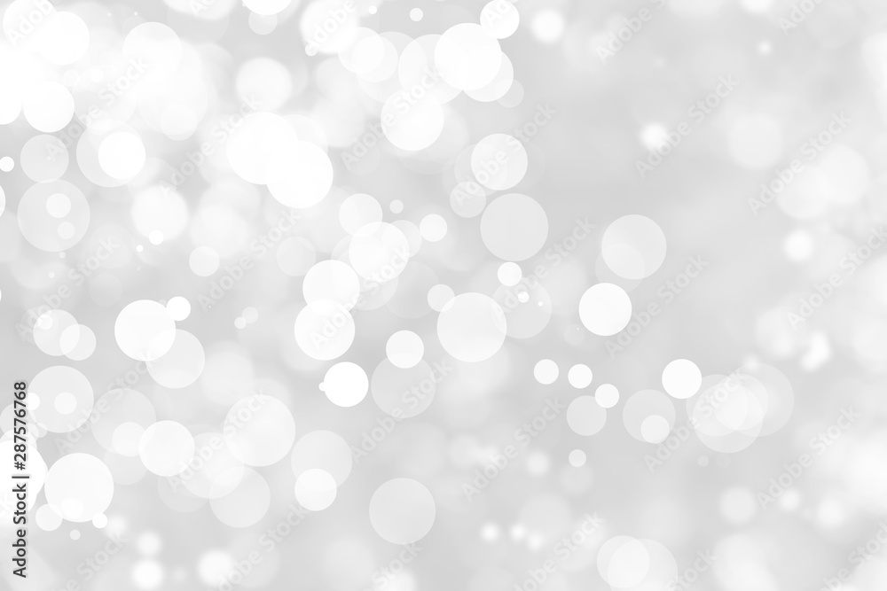 Abstract background with White bokeh on gray background. christmas blurred beautiful shiny Christmas lights. Abstract background with White bokeh on gray background. christmas blurred beautiful shiny Christmas lights.