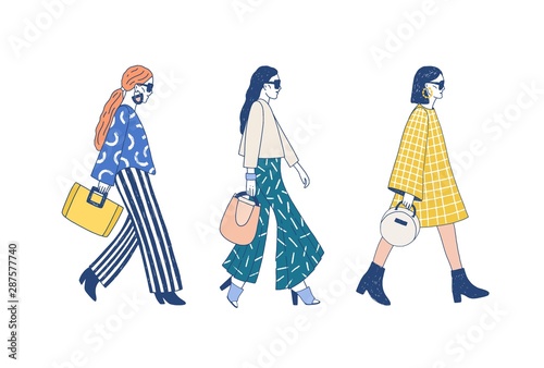 Fashion show runway flat vector illustration. Models dressed in haute couture clothing cartoon characters on white background. Designer demonstrating latest collection. Topmodel wearing trendy outfit.