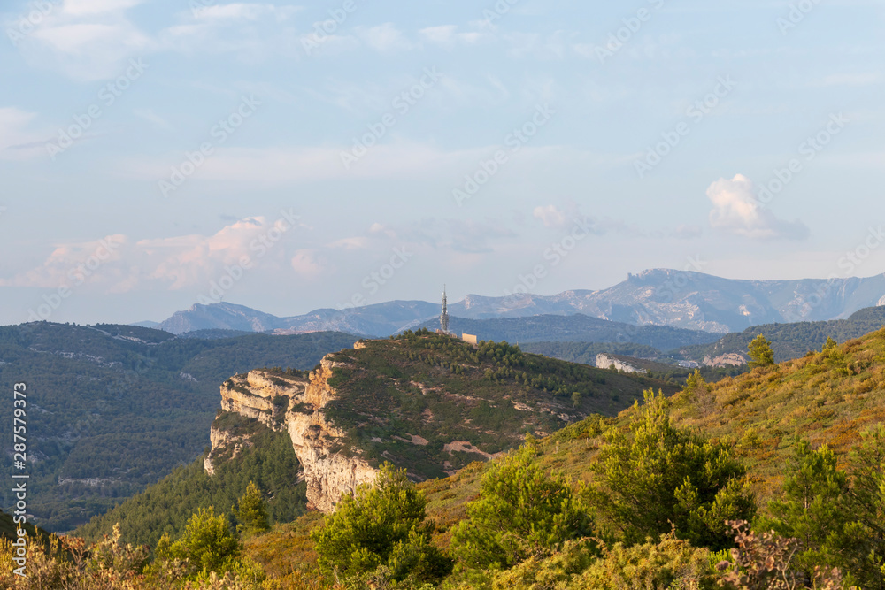 Sandstone cliffs and green forest of Cap Canaille, Falaises Soubeyranes, Southern France