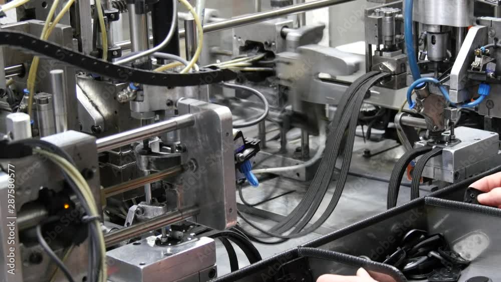 Assembly worker in factory production line Assembly worker in factory production line