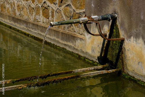 Fountain flowing in french village