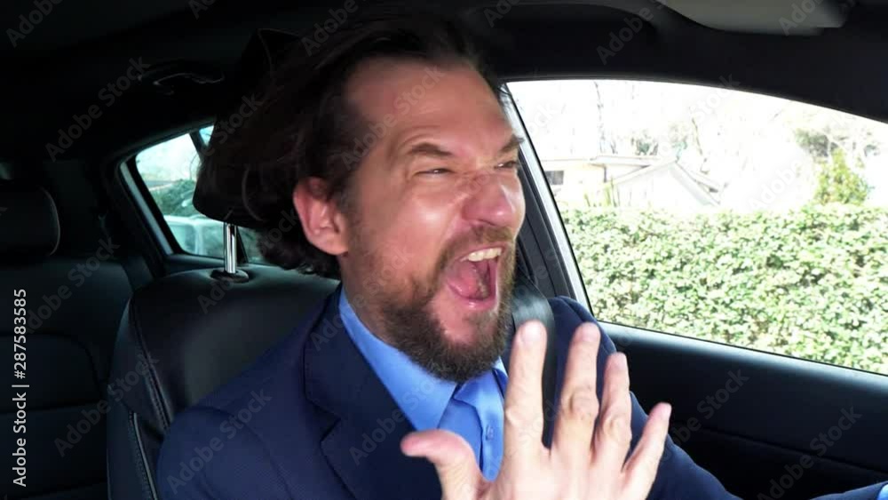 Funny business man dancing in car closeup Funny business man dancing in car closeup