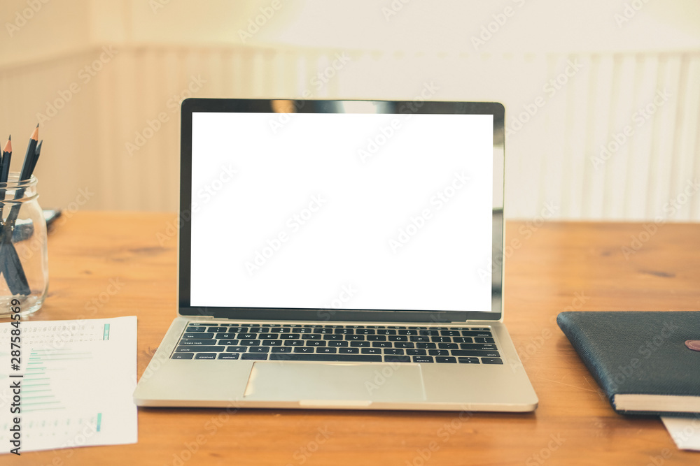 computer notebook on desk table at workplace computer notebook on desk table at workplace